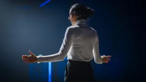 Female Motivational Speaker on Stage